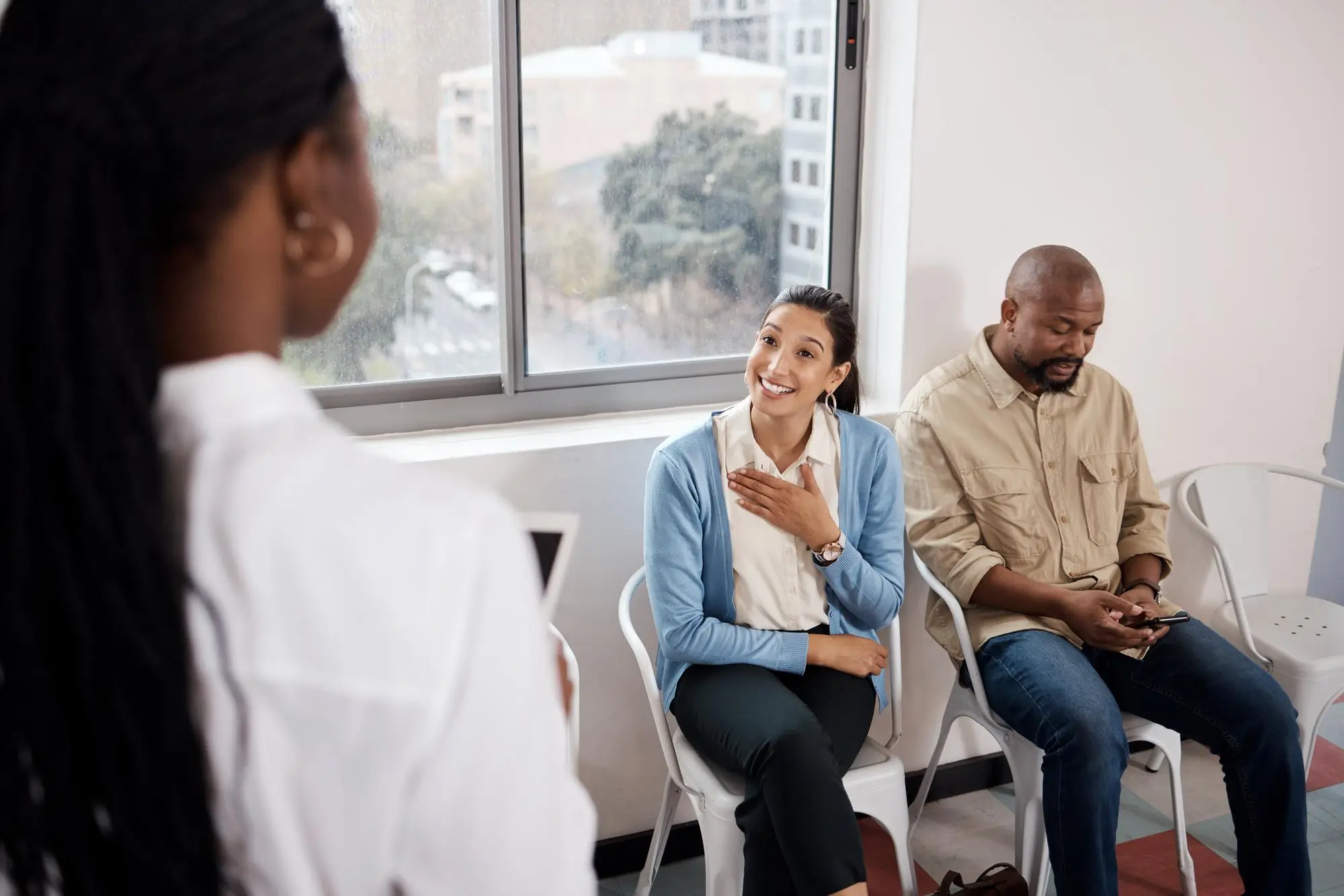 woman talking to healthcare provider in a medical clinic